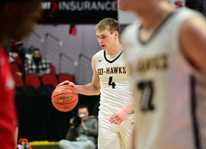 Waverly-Shell Rock's Cole Marsh dribbles up the court against Davenport Assumption during the Class 3A state championship game at Wells Fargo Arena in Des Moines on Friday. (Photo by Ryan Timmerman)